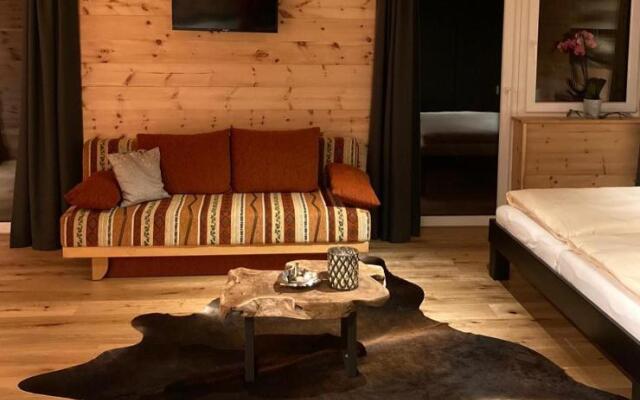 Zirben Appartement zwischen Berg und See