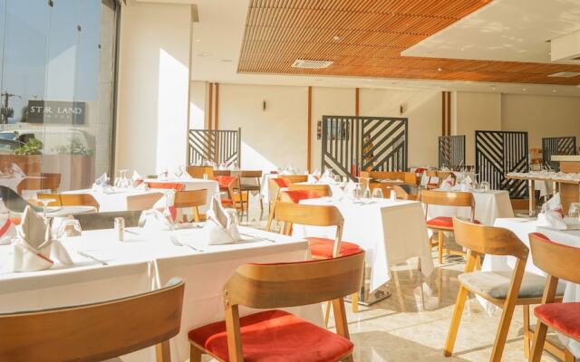 Star Land Hotel Bastos