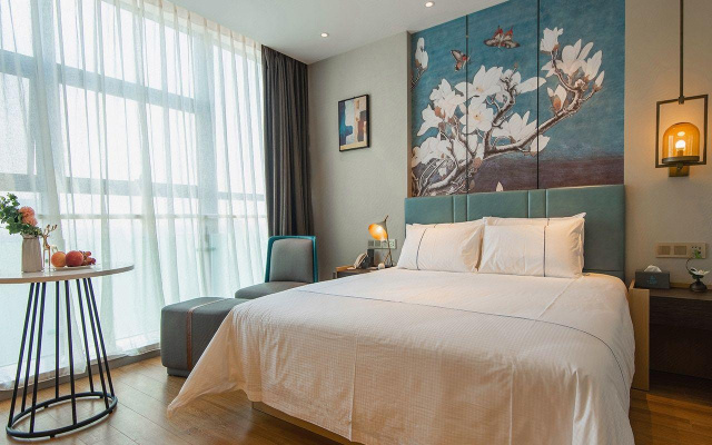 Magnotel Hotel (Anxi Tea Capital Baolong Plaza)