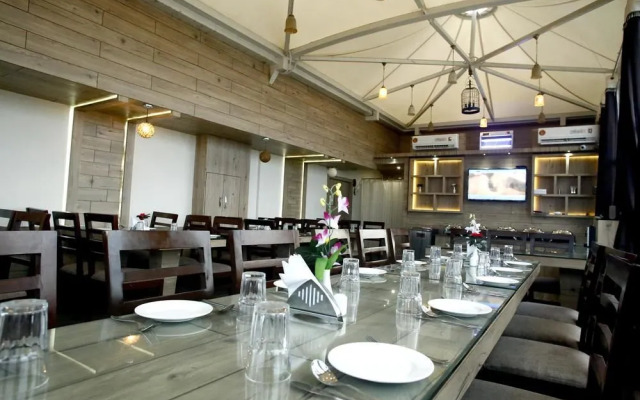 Capital O 9051 The Vedas