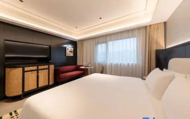 Qiwuli Hotel (Foshanxi Railway Station Shadi Airport)