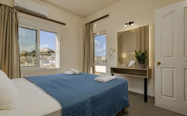 Theos village apartments
