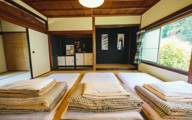 Guesthouse Momonga Village - Hostel