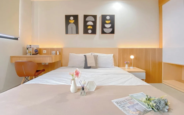 Cozy Living Studio at Evenciio Margonda Apartment