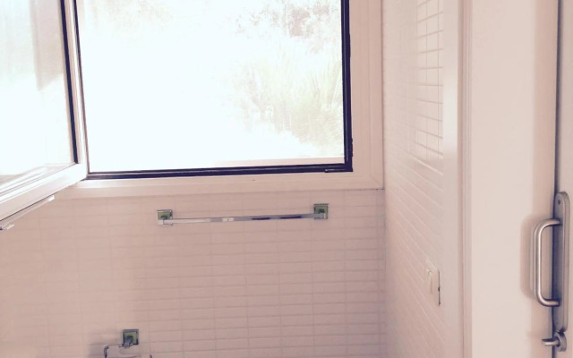 Villa in protected space in front of the sea