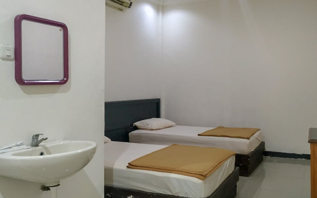 Palu City Guest House RedPartner