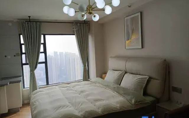 Xingcheng Homestay (Wuchang Railway Station Wushang Dream Times)