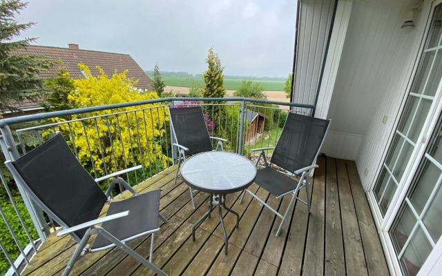 Ferienwohnung im Poolhaus mit Ostseeblick