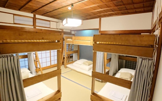기숙사 내 침대 (여성용 기숙사) 사진 1