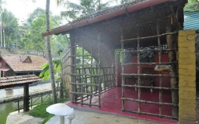 Roomys Nest Ashtamudi Homes