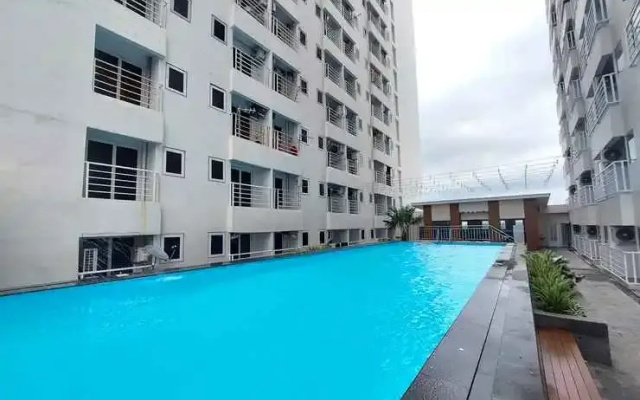 Warm and Homey Studio Apartment at Mansyur Residence By Travelio
