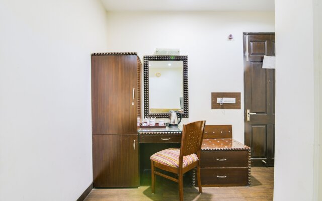 Cosy Grand @Chanakyapuri by The Cosy Hotels.