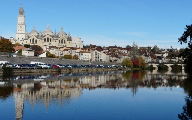 Lovely holiday home in Biron with fenced swimming pool
