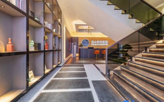 Yixin Design Hotel (Dongguan Liaobu Wanrun Plaza)