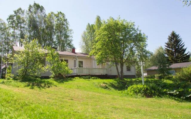 Authentic Wooden House by the River with an Igloo