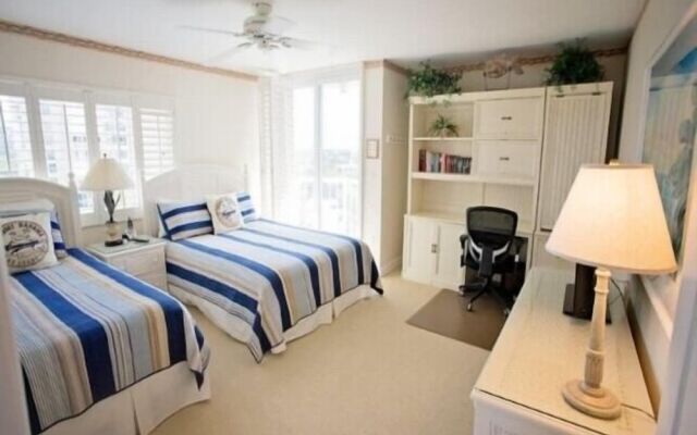 Cozy Condo with Gorgeous View of the Beach and Gulf by RedAwning