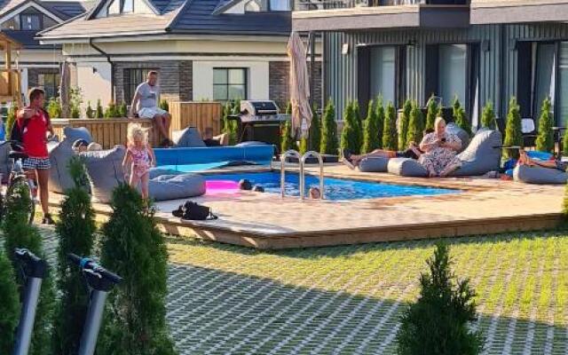 Vaivorykštės 7D apartamentai (su baseinu)