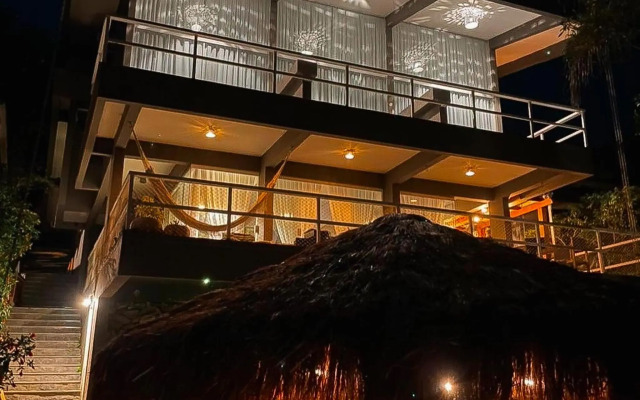 Linda casa pé na areia para até 16 pessoas