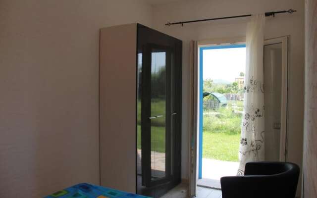 Room in Guest Room - S'olivariu Village Affittacamere - Deluxe King Room