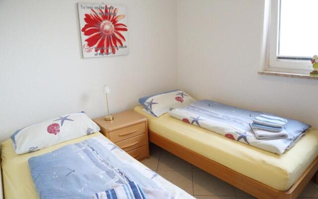 FeWo Tietjen, mit Meerblick, Strandhochhaus F9