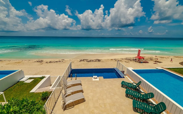 Private pool in beach front Villa