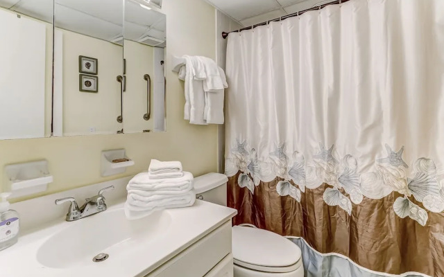 Oceanfront Beach Condo with Private Balcony, Short Walk to Pool and Beach by RedAwning