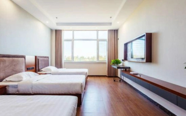 99 Xinbiao Hotel (Binzhou Yangxin Bus Station Lubei Street)