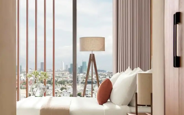 Signature By M Village Beachfront Hotel