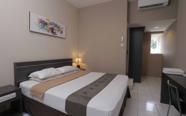 RedDoorz @ Sunset Point Seminyak – Guest Rooms – Kuta