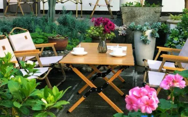 Nanshe Xiyi Garden courtyard view Holiday Hotel