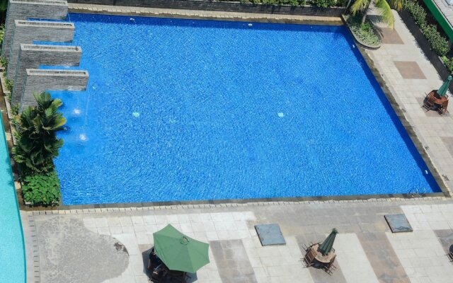Parquette Studio Green Lake Apartment near Ciputat By Travelio