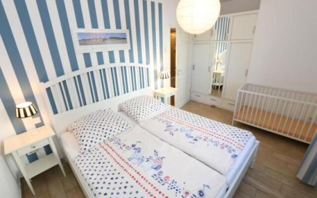 Kurparkresidenz Baabe - Ferienwohnung Meeresgarten mit Terrasse