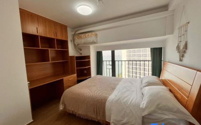 Huanzhu·Xiaoban Seaview Apartment (Haikouwan Poly Branch)