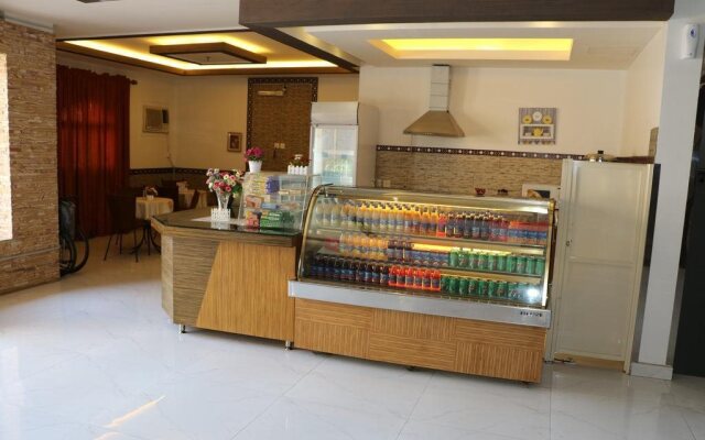 Al Alya Hotel Rooms and Suites
