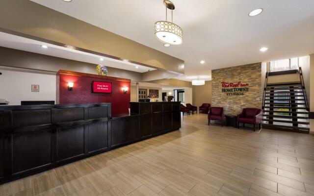 HomeTowne Studios by Red Roof Painted Post