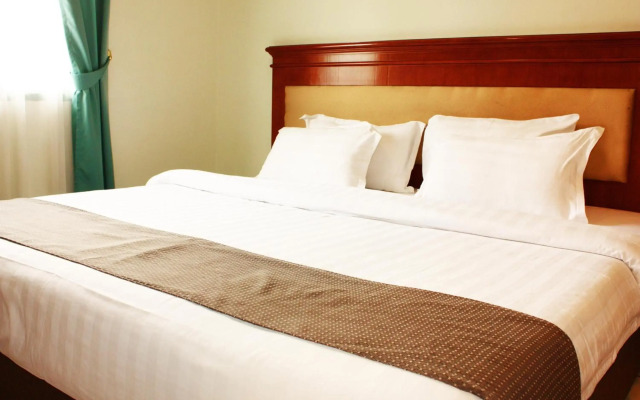 Travellers Suites Serviced Apartments