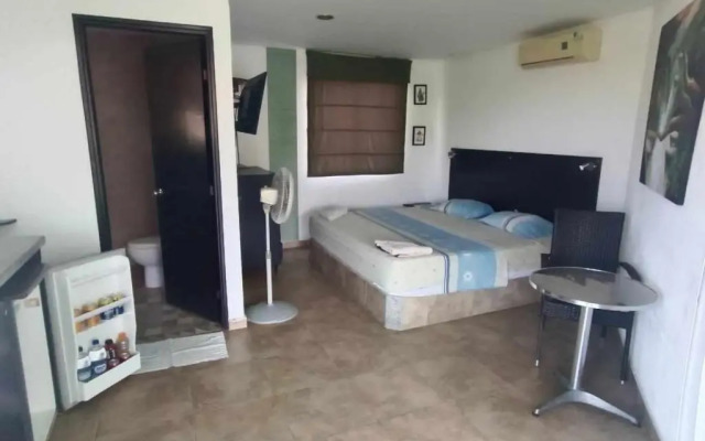 ApartaHotel El Oasis