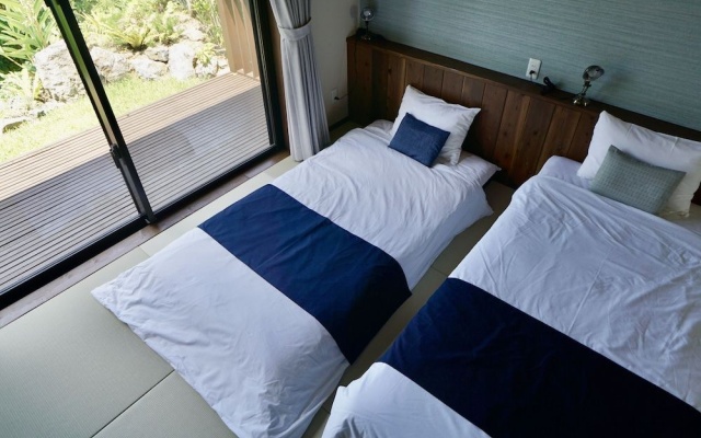 Sannin Resort – Guest Rooms – Motobu