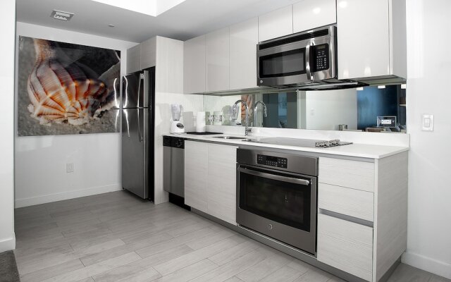 Private Residences at Beachwalk by SoFla Vacations