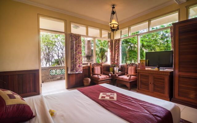 Отель Melasti Kuta Beach Hotel and Spa