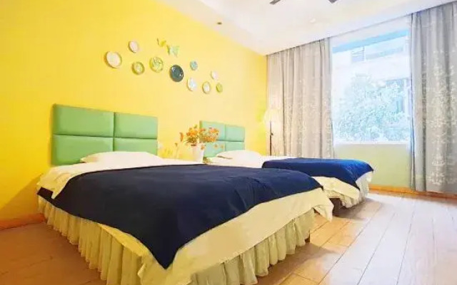 Q+ Dove Flower Hotel (Emei Mountain Baoguo Temple)