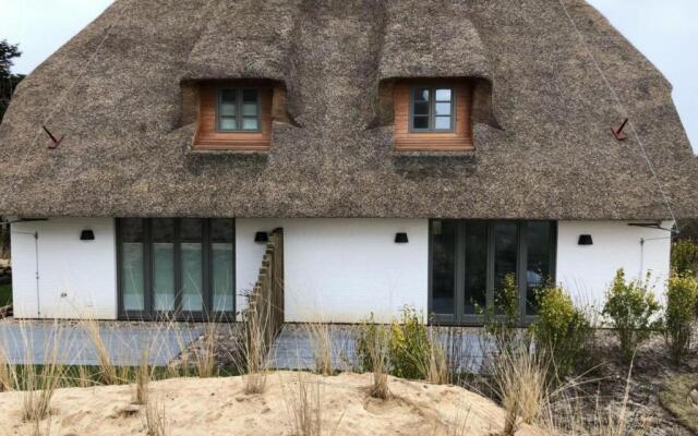 Rantum Dorf - Ferienappartments im Reetdachhaus 1& 2