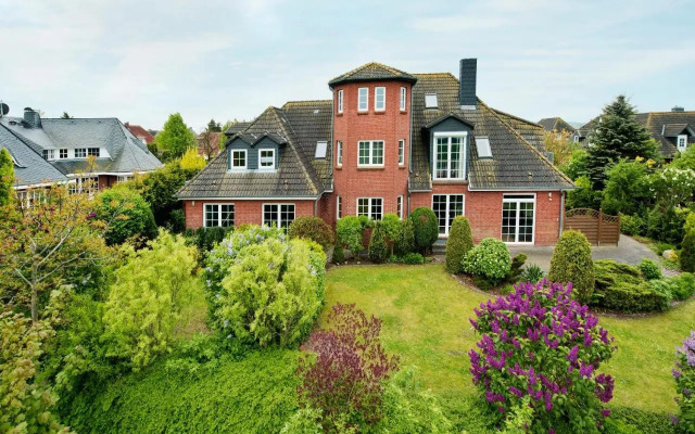 Ferienwohnung im Poolhaus mit Ostseeblick