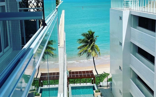 Pé na areia do Caribessa - Branco Haus