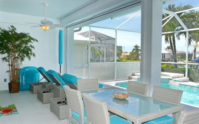 Relaxing Waterfront Home With Pool and Steps to Beach