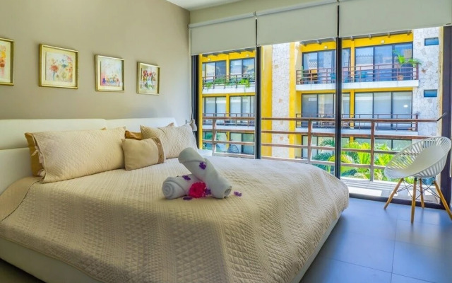 Lunada 314 Modern Playa del Carmen Condo with Tropical Garden View by RedAwning