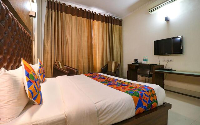 FabHotel Happy Residency
