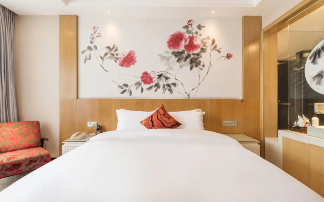 Paco Business Hotel Luo Gang Wan Da Branch