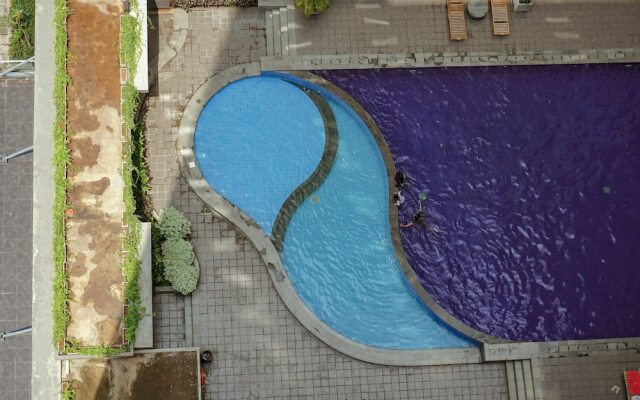 Tranquil Green Pramuka 2BR Apartment near Shopping Center
