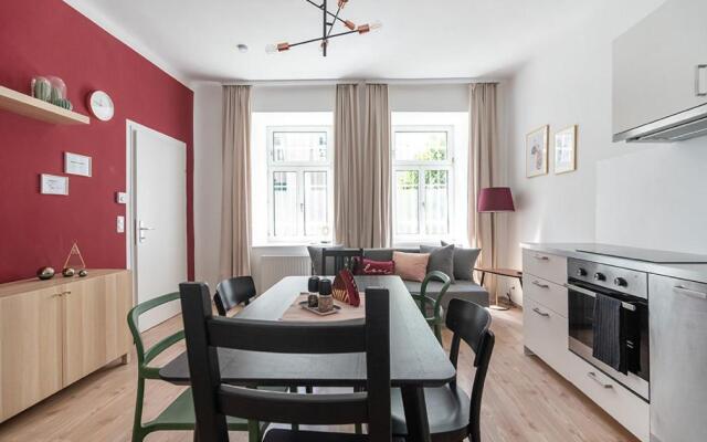 Colorful Apartment Facing Green Courtyard